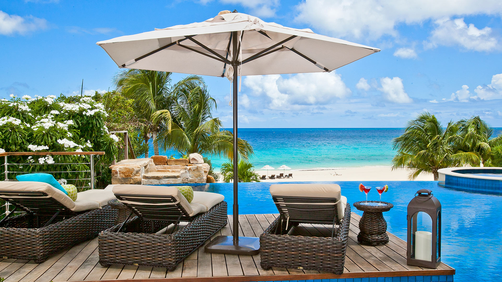 Take in the stunning views of the Caribbean Sea from the pool deck